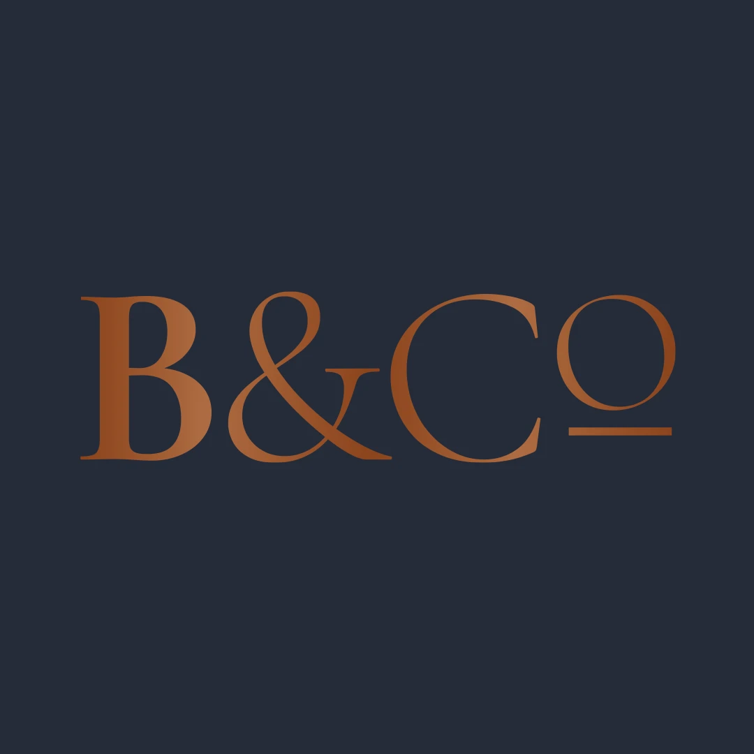 Barazarte & Co logo in elegant bronze typography on dark background | B&Co